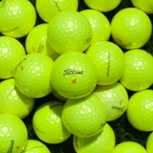 Yellow titleist pro v1x - pro,